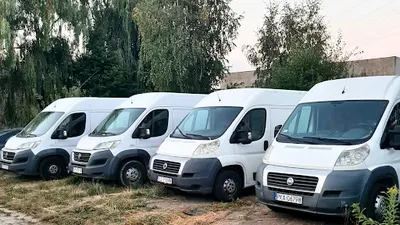 SYKURENT wynajem samochodów dostawczych , lawety